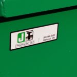 photo of JT Fabrication word mark on new made in Canada self dump hopper for waste and recycling